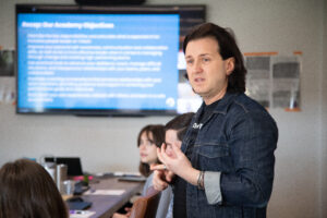 Our CEO, Josh Saterman, facilitating an AI workshop